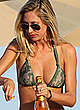 Lauren Stoner drink champaign on a beach pics