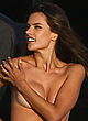 Alessandra Ambrosio naked pics - topless but hiding her boobs