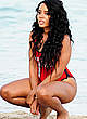 Angela Simmons wearing a red swimsuit pics