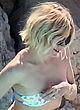 Sienna Miller slips out of her tube bikini pics