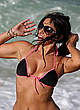 Claudia Romani in bikini on a beach candids pics