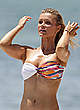 Joanna Krupa paddleboarding in bikini pics