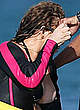 Mariah Carey naked pics - boobslip wearing a wetsuit