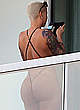 Amber Rose flashing her ass on a balcony pics