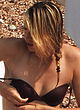 Maria Sharapova showing her round bikini ass pics