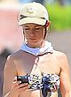 Juliette Lewis in tube bikini top & cutoffs pics