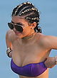 Kylie Jenner busty in a purple tube bikini pics