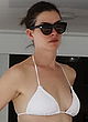 Anne Hathaway busty in a tiny two-piece pics