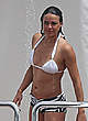 Michelle Rodriguez paddleboarding in white bikini pics