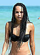 Zoe Kravitz in black bikini at a beach pics