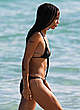 Zoe Kravitz in black bikini on a beach pics