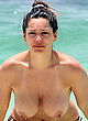 Kelly Brook caught topless at the beach pics