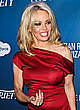Pamela Anderson pokies under red dress pics