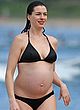 Anne Hathaway caught pregnant in bikini pics