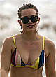 Hilary Duff wearing a bikini at a beach pics