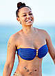 Melanie Brown in blue bikini on a beach pics