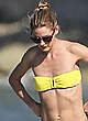Olivia Palermo in yellow bikini on a beach pics