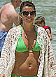 Coleen Rooney in green bikini on a beach pics
