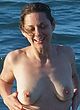 Marion Cotillard topless swimming at the beach pics
