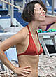 Rebecca Hall in red bikini on a beach pics