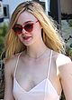 Elle Fanning braless in tiny pink sundress pics