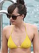 Dakota Johnson shows pokies in yellow bikini pics