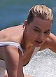 Margot Robbie hot nipple-slip while surfing pics