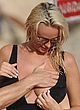 Rhian Sugden gets her boob groped at beach pics