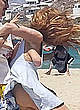 Lindsay Lohan sideboob at a beach pics