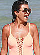 Kourtney Kardashian in pink swimsuit in miami pics