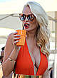 Rhian Sugden cleavage in orange swimsuit pics