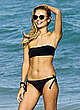 Natasha Poly in black bikini on miami beach pics