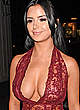 Demi Rose posing in a see through dress pics