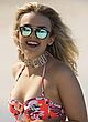 Tallia Storm showing ass in floral swimsuit pics
