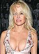Pamela Anderson showing off deep cleavage pics