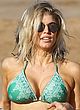 Stacy Ferguson shows sideboob in green bikini pics