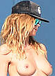 Heidi Klum naked pics - topless on her balcony