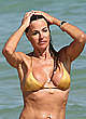 Kelly Bensimon pokies in yellow bikini pics