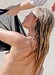 Elsa Hosk naked pics - flashing her tits at a beach