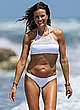 Kelly Bensimon in white bikini on a beach pics