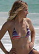 Sienna Miller wearing a bikini at a beach pics