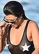 Kourtney Kardashian busty in monochrome swimsuit pics