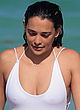 Natalie Martinez shows nipples in wet swimsuit pics