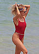 Shea Marie in red swimsuit on a beach pics