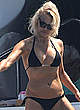 Pamela Anderson in black bikini on a yacht pics