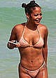 Christina Milian in skimpy bikini on a beach pics
