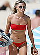 Amy Pejkovic in red tiny bikini on a beach pics