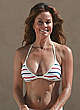 Brooke Burke workout in striped bikini pics