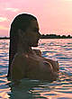 Alessandra Ambrosio topless in a water pics