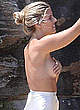 Natasha Oakley naked pics - sexy and braless on a beach